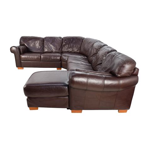Raymore and flanagans - Meet your new favorite recliner times two—the Toby sofa has left- and right-side reclining. Settle back into 3-position chaise-style reclining, pillow arms and pocket-coil cushions that add support beyond what foam alone can offer. Plus, the rich look of leather is actually worry-free microfiber upholstery finished with contrasting top stitching.